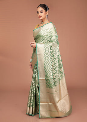 Green Tissue Silk Saree With Blouse Piece