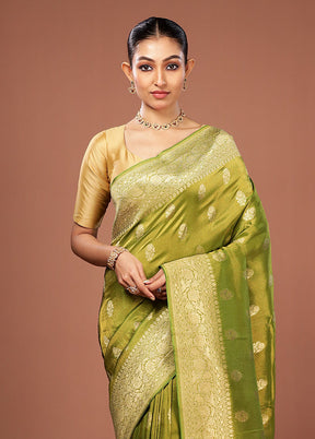 Green Tissue Silk Saree With Blouse Piece