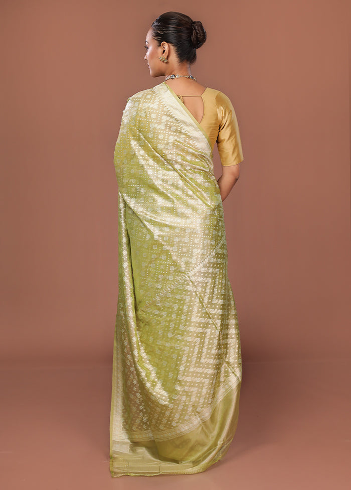 Green Tissue Silk Saree With Blouse Piece