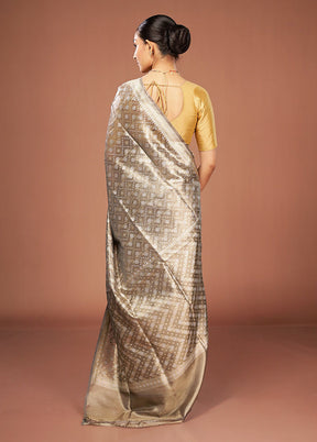 Cream Tissue Silk Saree With Blouse Piece