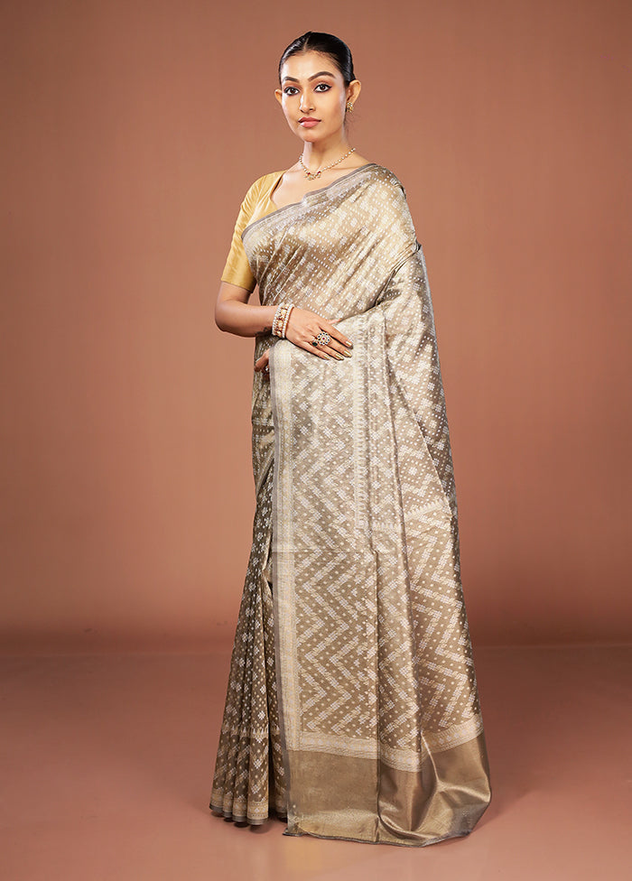 Cream Tissue Silk Saree With Blouse Piece
