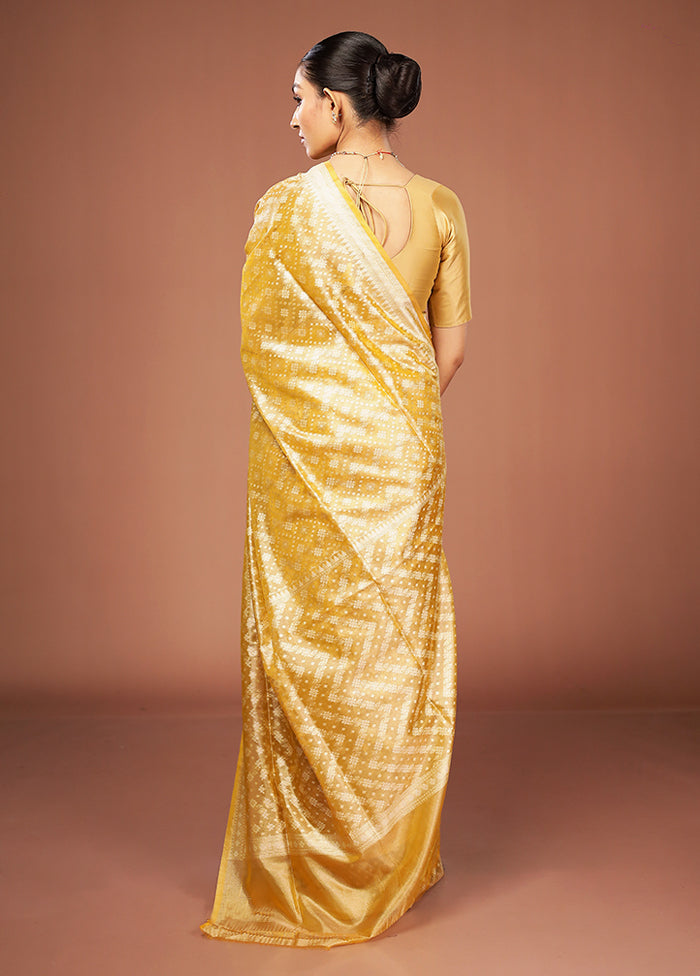 Yellow Tissue Silk Saree With Blouse Piece