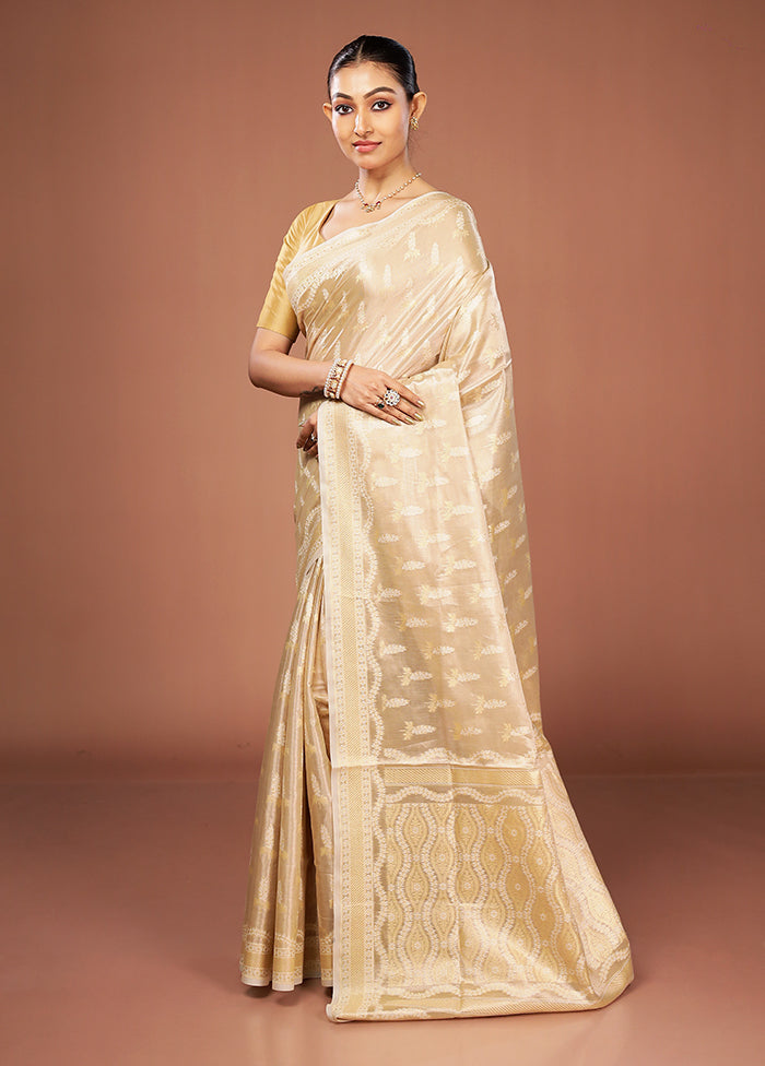 Cream Tissue Silk Saree With Blouse Piece