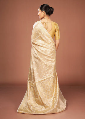 Cream Tissue Silk Saree With Blouse Piece