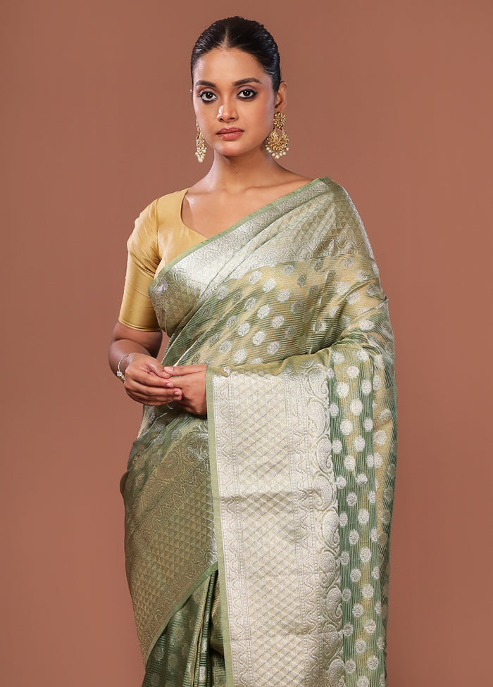 Green Tissue Silk Saree With Blouse Piece