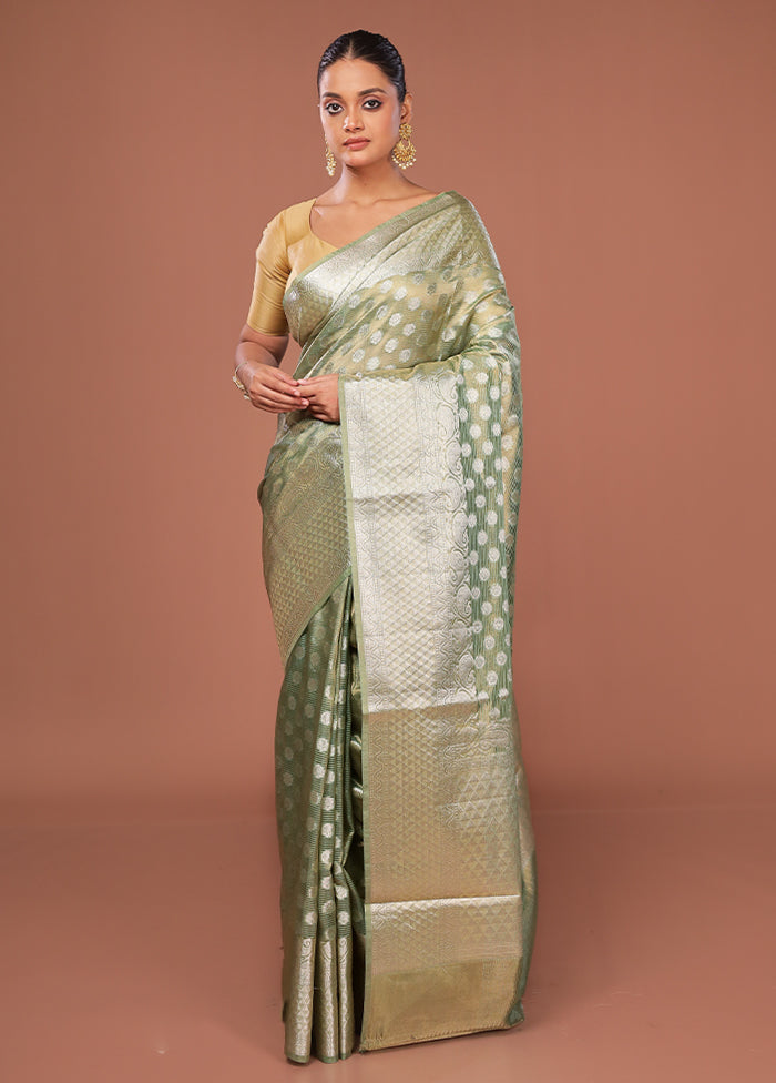 Green Tissue Silk Saree With Blouse Piece