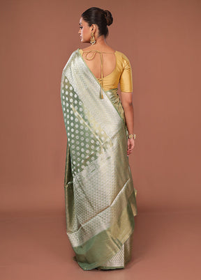 Green Tissue Silk Saree With Blouse Piece