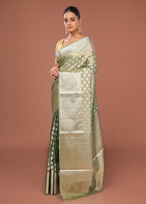 Green Tissue Silk Saree With Blouse Piece