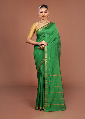 Green Kanjivaram Silk Saree With Blouse Piece
