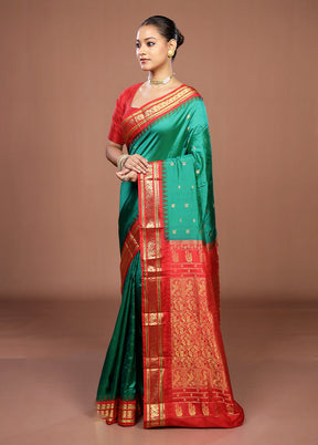 Green Handloom Kanjivaram Pure Silk Saree With Blouse Piece