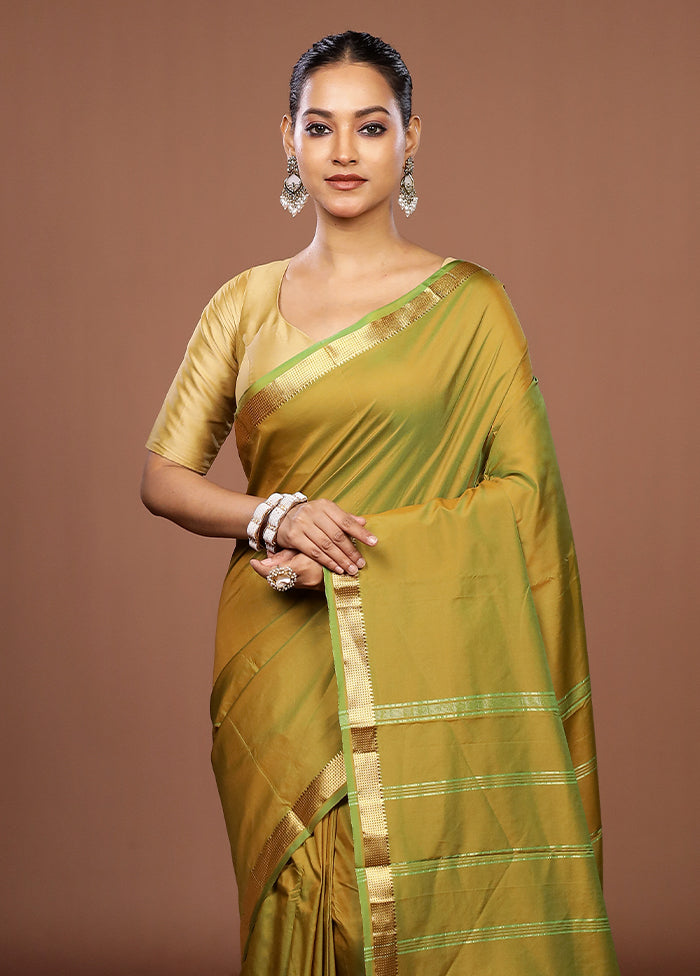 Green Kanjivaram Silk Saree With Blouse Piece