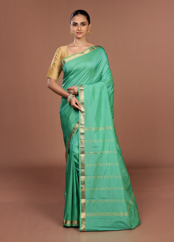 Green Kanjivaram Silk Saree With Blouse Piece