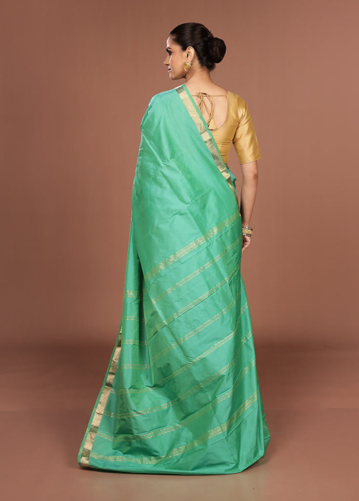 Green Kanjivaram Silk Saree With Blouse Piece