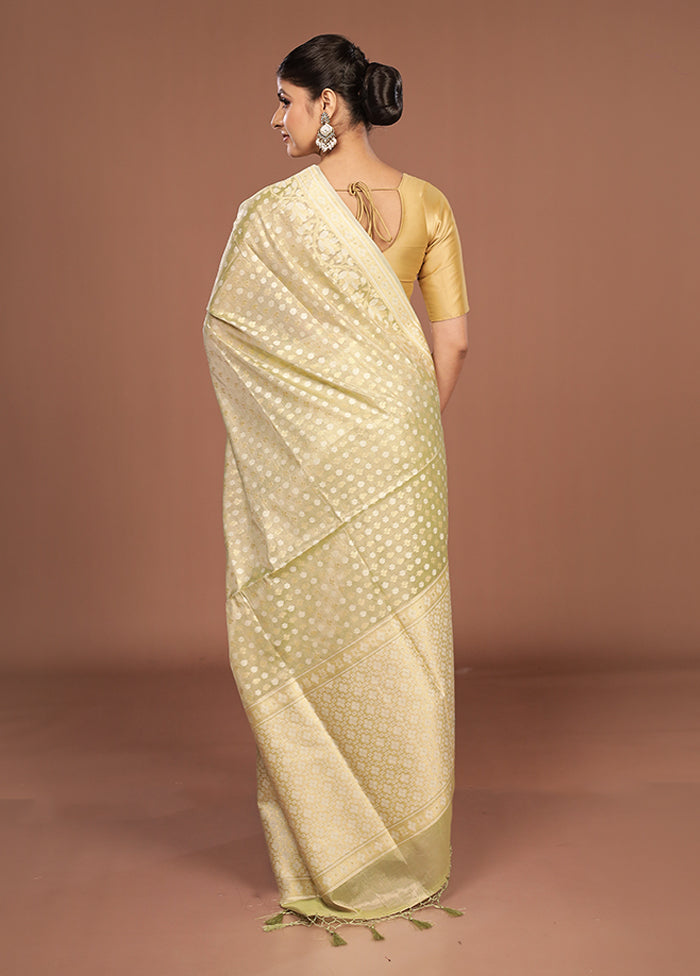 Cream Tissue Silk Saree With Blouse Piece