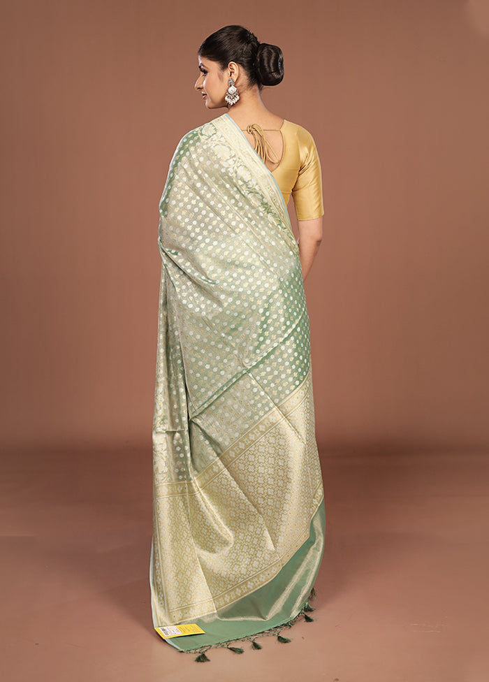 Green Tissue Silk Saree With Blouse Piece