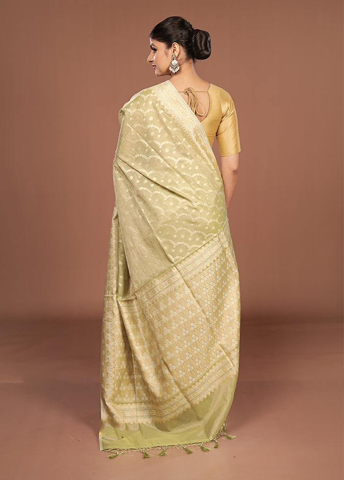 Green Tissue Silk Saree With Blouse Piece