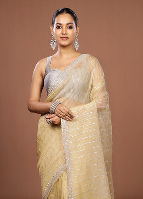 Cream Tissue Silk Saree With Blouse Piece