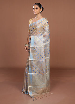 Cream Tissue Silk Saree With Blouse Piece