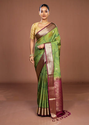 Green Kanjivaram Silk Saree With Blouse Piece