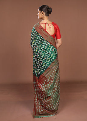 Green Ikkat Silk Saree With Blouse Piece