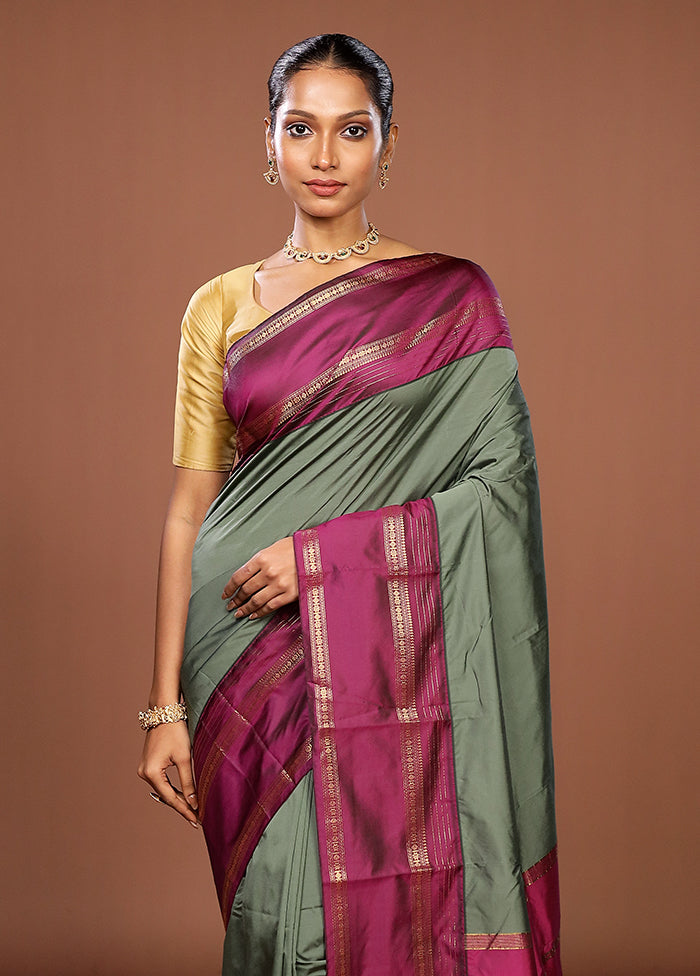 Green Kanjivaram Silk Saree With Blouse Piece