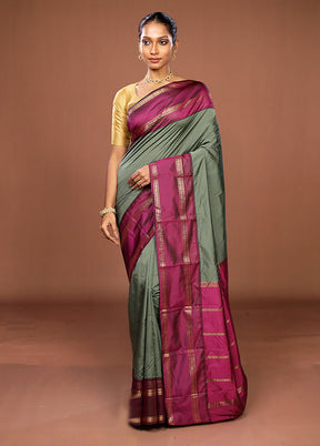 Green Kanjivaram Silk Saree With Blouse Piece