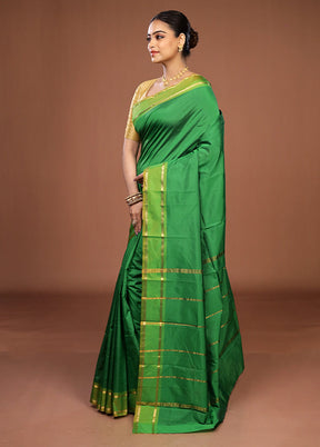 Green Kanjivaram Silk Saree With Blouse Piece