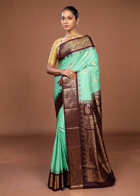 Green Kanjivaram Silk Saree With Blouse Piece