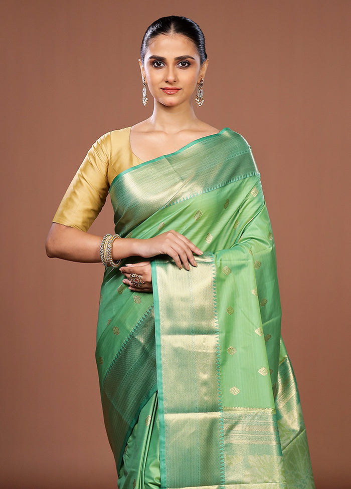 Green Kanjivaram Silk Saree With Blouse Piece