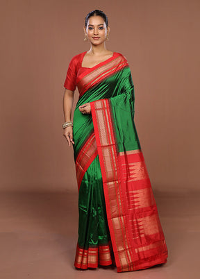 Green Handloom Kanjivaram Pure Silk Saree With Blouse Piece