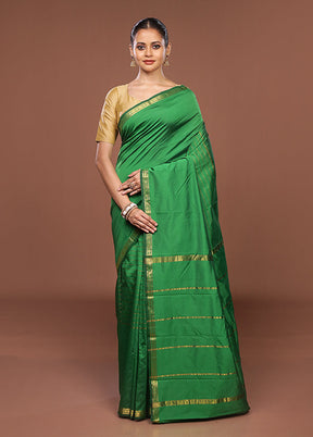 Green Kanjivaram Silk Saree With Blouse Piece