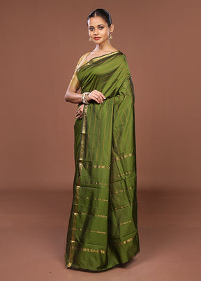 Green Kanjivaram Silk Saree With Blouse Piece