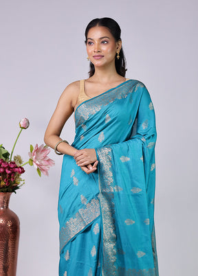 Chandan Haze Duo – Cream Assam Silk & Blue Dupion Silk Sarees