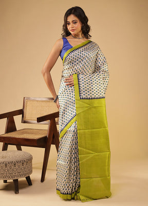 Cream Printed Pure Silk Saree With Blouse Piece