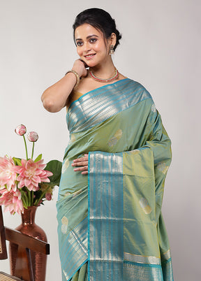 Green Kanjivaram Silk Saree With Blouse Piece