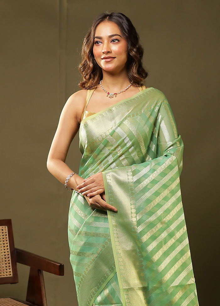 Green Tissue Silk Saree With Blouse Piece