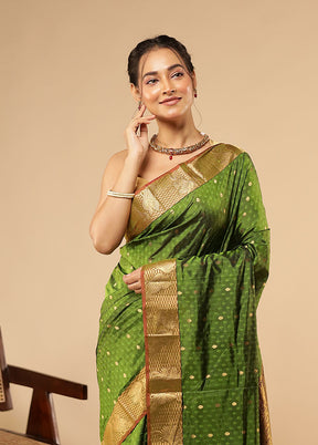 Green Kanjivaram Silk Saree With Blouse Piece