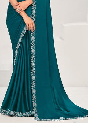 Teal Crepe Silk Saree With Blouse Piece