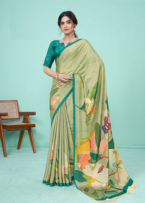 Pista Green Crepe Silk Saree With Blouse Piece