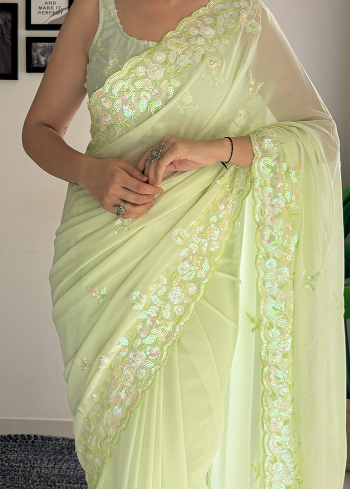 Pista Green Georgette Saree With Blouse Piece