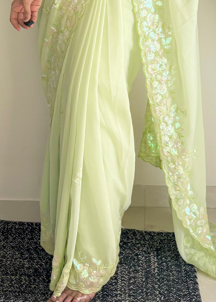 Pista Green Georgette Saree With Blouse Piece