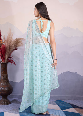 Sea Green Net Net Saree With Blouse Piece