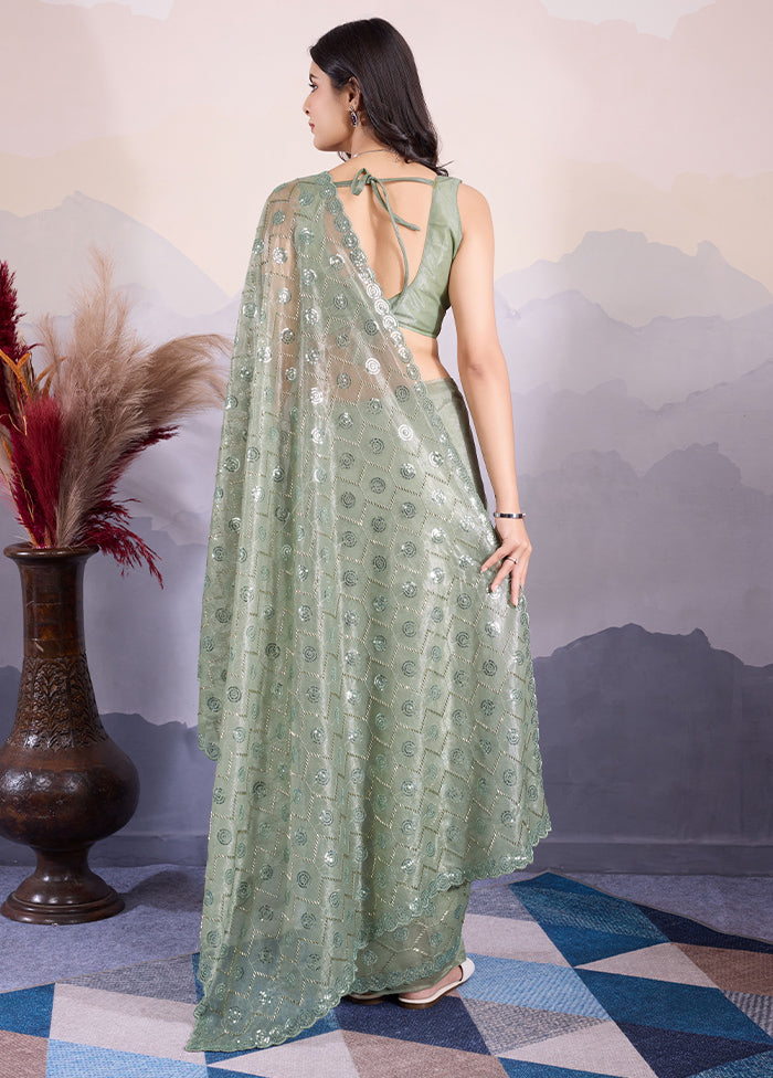 Green Net Net Saree With Blouse Piece