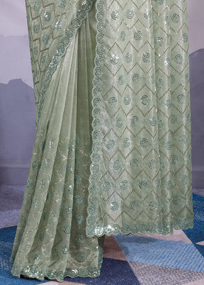 Green Net Net Saree With Blouse Piece