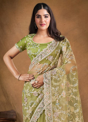 Green Net Net Saree With Blouse Piece