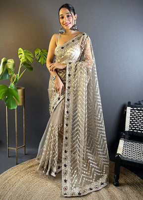 Beige Net Net Saree With Blouse Piece