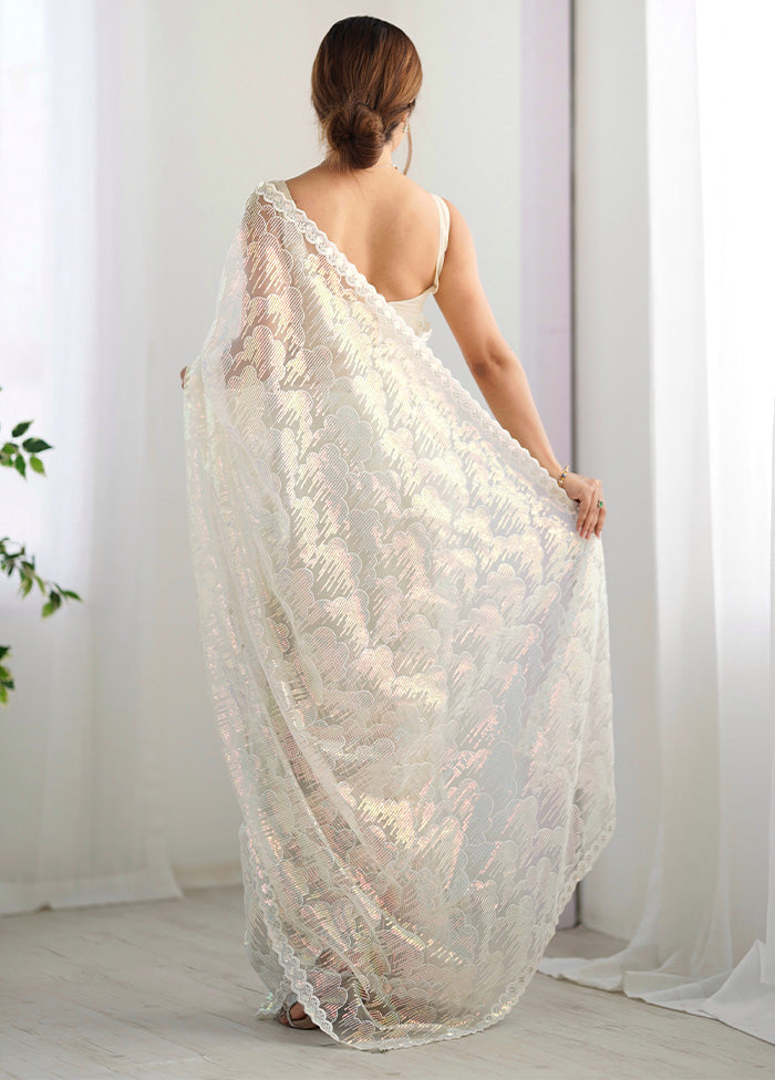 Cream Net Net Saree With Blouse Piece