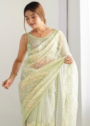 Pista Green Net Net Saree With Blouse Piece