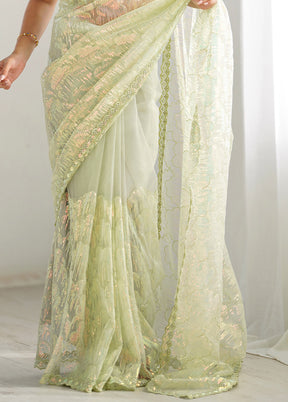 Pista Green Net Net Saree With Blouse Piece