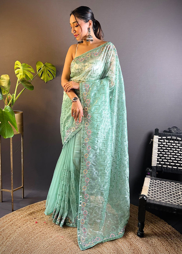 Sea Green Net Net Saree With Blouse Piece